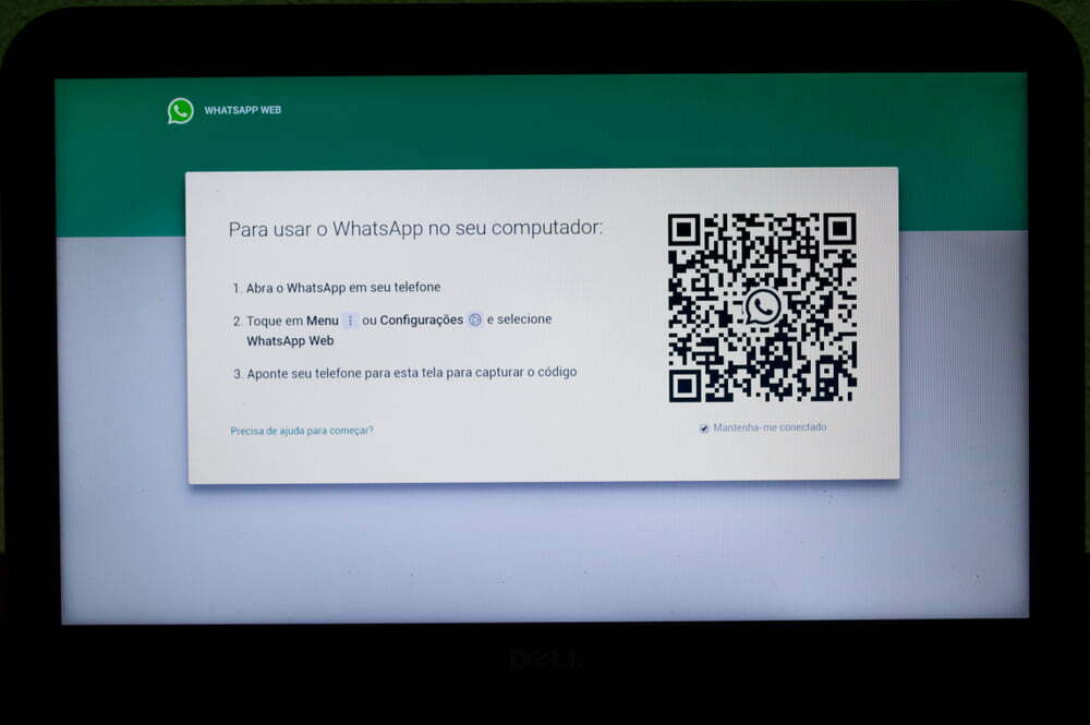 Página de inicio del sitio web WhatsApp Web visto por una computadora portátil